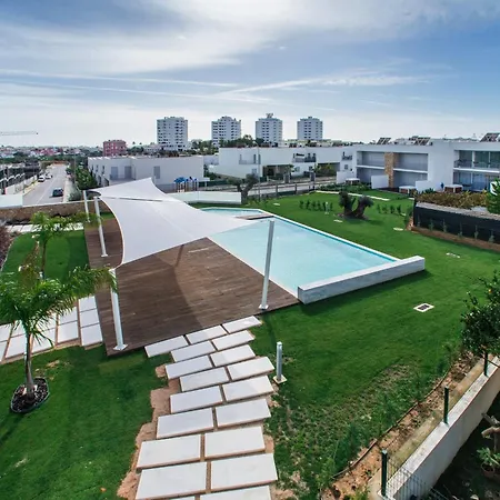 Апартаменты Lovely Modern With Pool